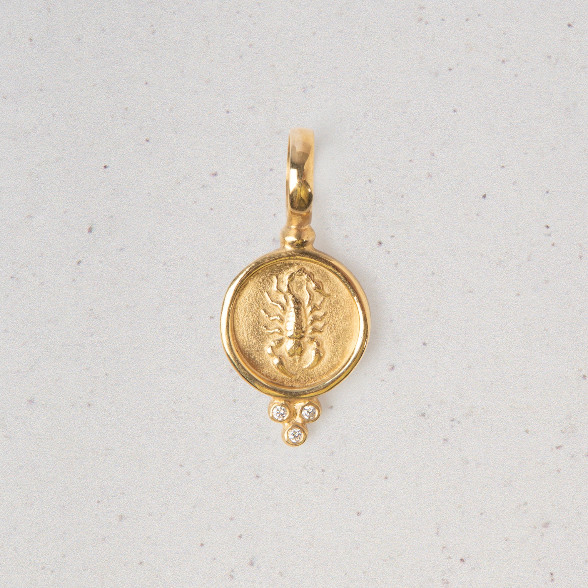 18 Karat Gold Zodiac Pendants with Diamonds