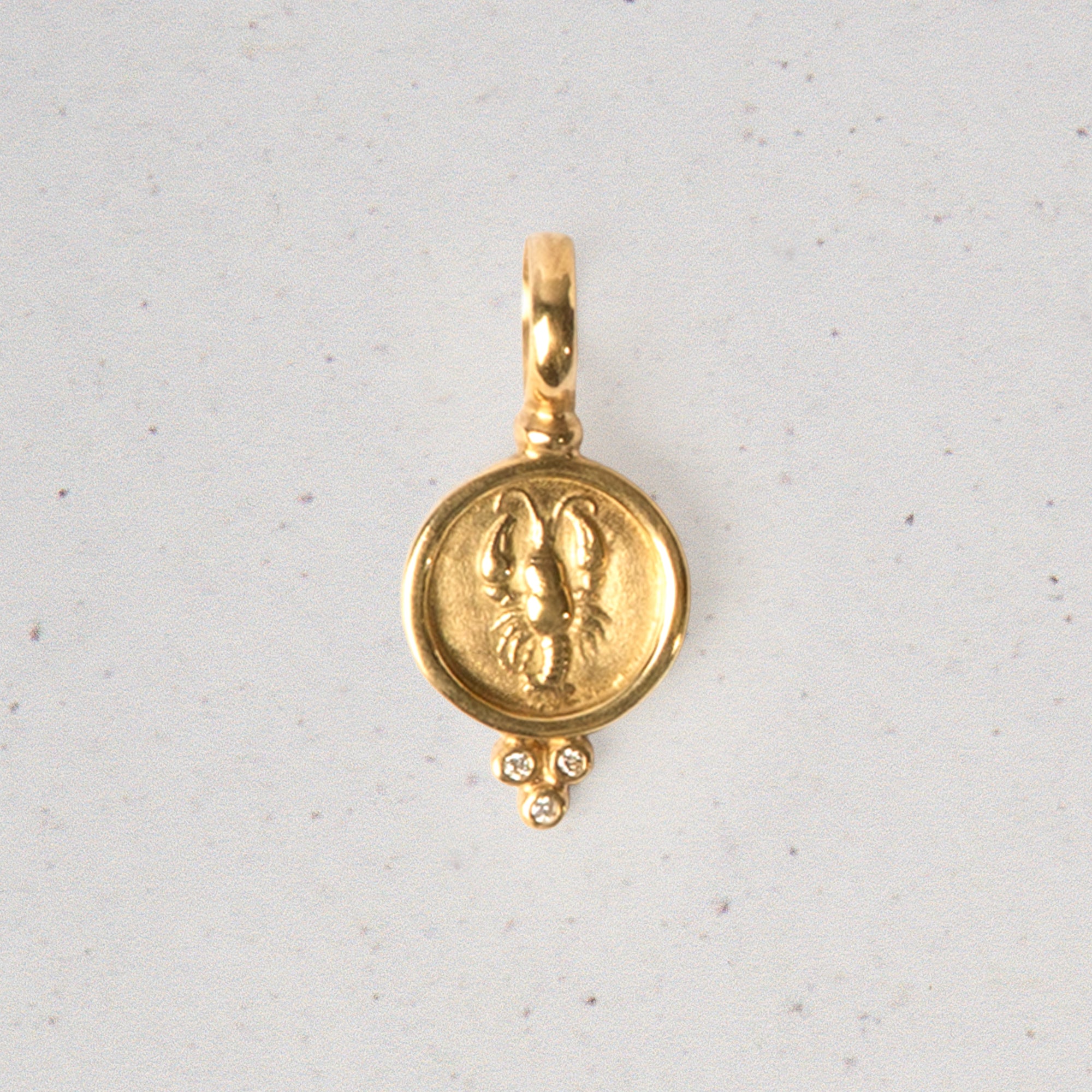 18 Karat Gold Zodiac Pendants with Diamonds